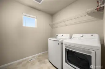 Laundry room has plenty of room for storage.