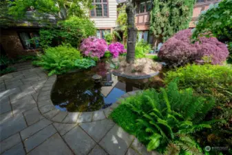 The ornamental pond makes for a relaxing area to reflect on your day.