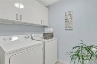 Large in-unit laundry room includes washer and dryer.