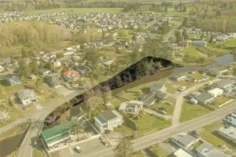 Aerial view with approx lot size highlighting to show shape of lot