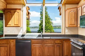 You can watch the ferry and other boats go by from your kitchen window.
