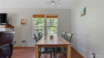 Dining room with cozy, rustic, island feel ,…