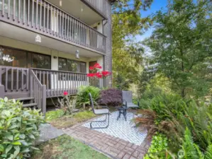 Enjoy your morning coffee or unwind in this tranquil spot.Stairs down from deck to  private patio area