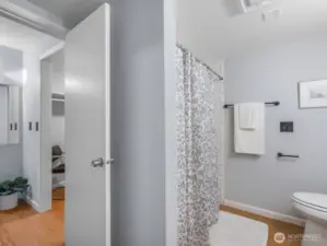 Closet along hallway from bathroom