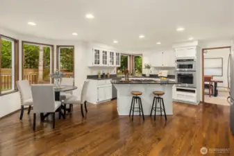 Nook and breakfast bar offer additional seating space for informal gatherings