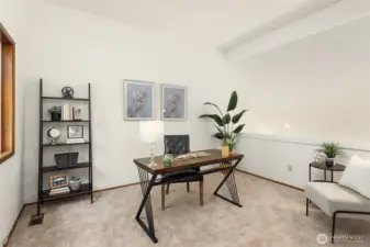 Home office or loft space conveniently located off the primary bedroom