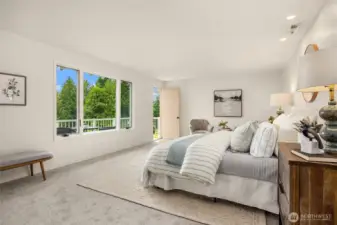 The primary suite is oversized with plenty of space for a king sized bed and a sitting area.. New carpet throughout.