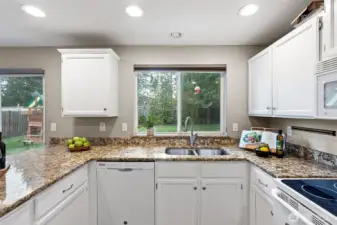 Imagine doing dishes here staring at that beautiful lawn! ; )