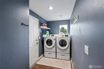 Laundry room/mud room. Door to garage