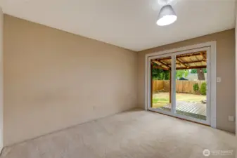 Bedroom 3 with access to the backyard oasis