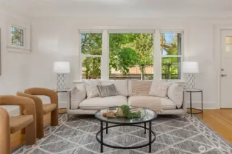 Filtered privacy from custom blinds, trees and signature fence.