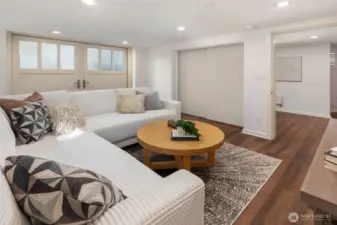 Truly a unique customization of the home. Ceiling mounted panels slide to open the room up or close it for privacy. Frosted glass double doors bring in soft light.