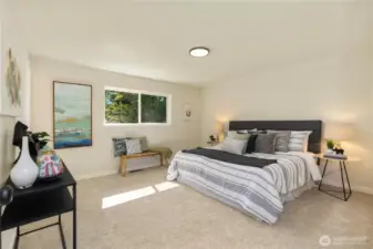 There is plenty of space for a king sized bed and all of your furnishings in the sizable primary bedroom.