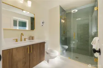 The primary bathroom is truly spa inspired and indulgent.