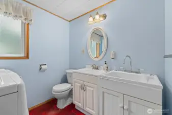 Laundry room with .25 bath and additional utility sink