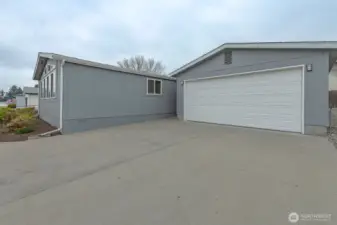 Two car garage and deep driveway.