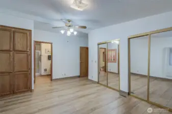 Primary bedroom with double closets.