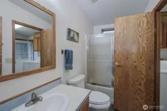 Laundry room also adjoins full bath.