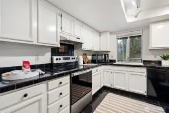Kitchen has great storage including a pantry off the hallway.