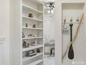 Main level office/ bedroom w/ hidden bookcase entry door.