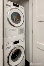 ~stacking w/d use to be in entry closet. Plumbing is still in wall. Owner wanted a large pantry so they moved the washer/dryer