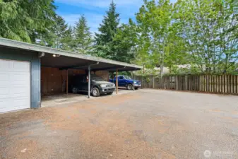 3 storage lockers behind the carport, one unit gets the garage.