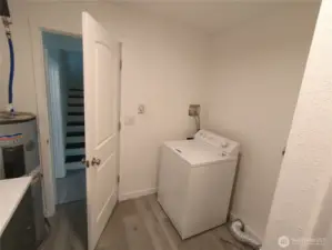 Main floor utilities and shower in the bathroom