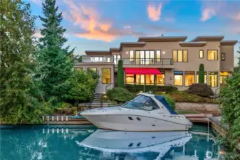 HOUSE COMES WITH A YACHT. Direct from your dock through the canal to Lake Washington