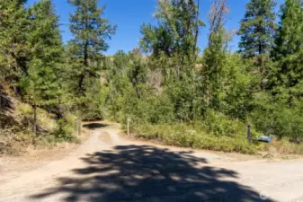 The property is accessed off Poorman Creek Cut-off Road which is County maintained and plowed in the winter.