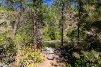 Step down from the grassy lawn to enter a number of small beaches and the perfect swimming hole!