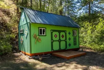 A storage shed provides dry storage for bikes, fishing gear and outdoor furniture.