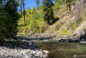 Nearly 800’ of riverfront offer numerous river rock and sand beaches, deep pools for swimming, and a myriad of places from which to cast your fly!