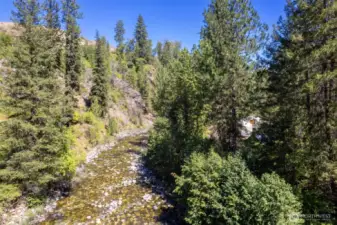 The river lies snug against a steep canyon offering dramatic scenery and privacy.