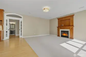 Family room, pocket doors to foyer