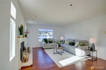 Spacious living room with beautiful hardwoods