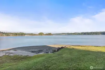 Beachfront setting with no-bank access and privately held tideland rights.