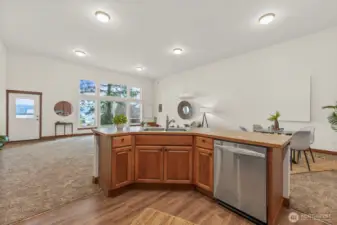 Well-appointed kitchen with stainless appliances, durable LVP floors, and ample cabinet space.