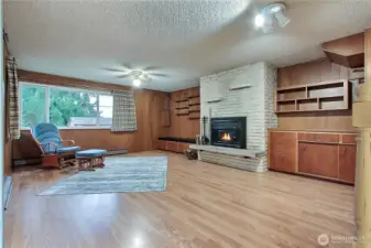 Large family room with wood burning fireplace