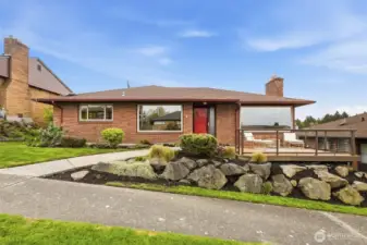 Classic midcentury modern brick with clean lines and timeless curb appeal