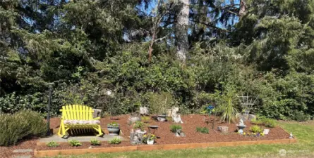 Facing west, Garden to great your guests on the upper driveway.