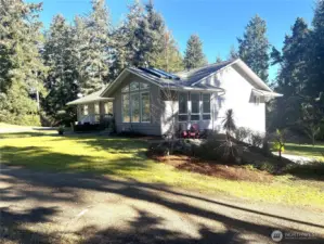 This well-planned custom home has everything you need to find beauty, privacy and good living...at the beach.