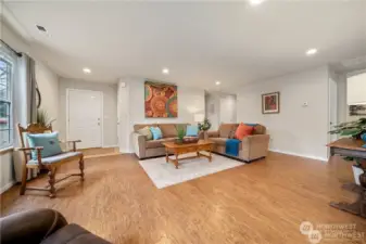 Spacious living room has hard surface flooring throughout living areas.