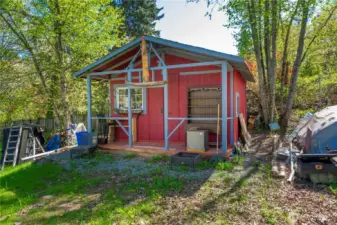 Outbuilding with small kitchenette and loft