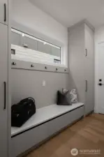 Mud room off the garage with plenty of custom storage