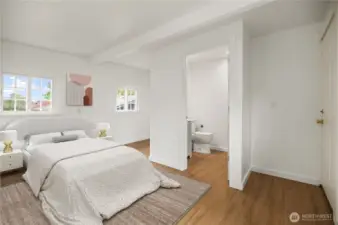 Main Floor Primary Bath with door to deck - virtually staged