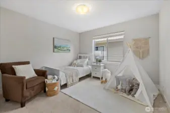 Bedroom #3, custom wood blinds included.