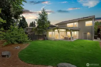 Lovely view of the back of the home @ twilight.