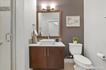 Main floor 3/4 bath with shower can accommodate guests or multi-generational living.