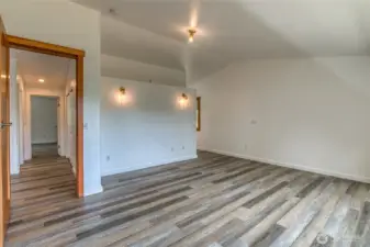Spacious primary at a different angle on the main floor.