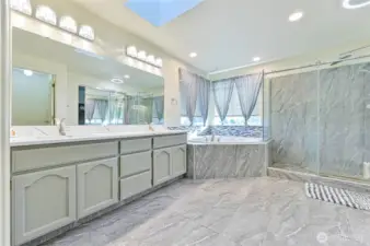 Enjoy your primary bathroom with large soaking tub and walk in shower!